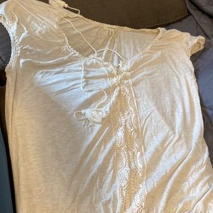 Cream colored top with nice accents